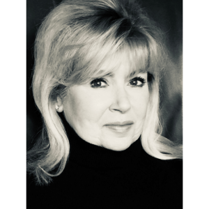 black and white photo of blonde woman wearing black turtleneck