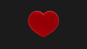 red heart on black background